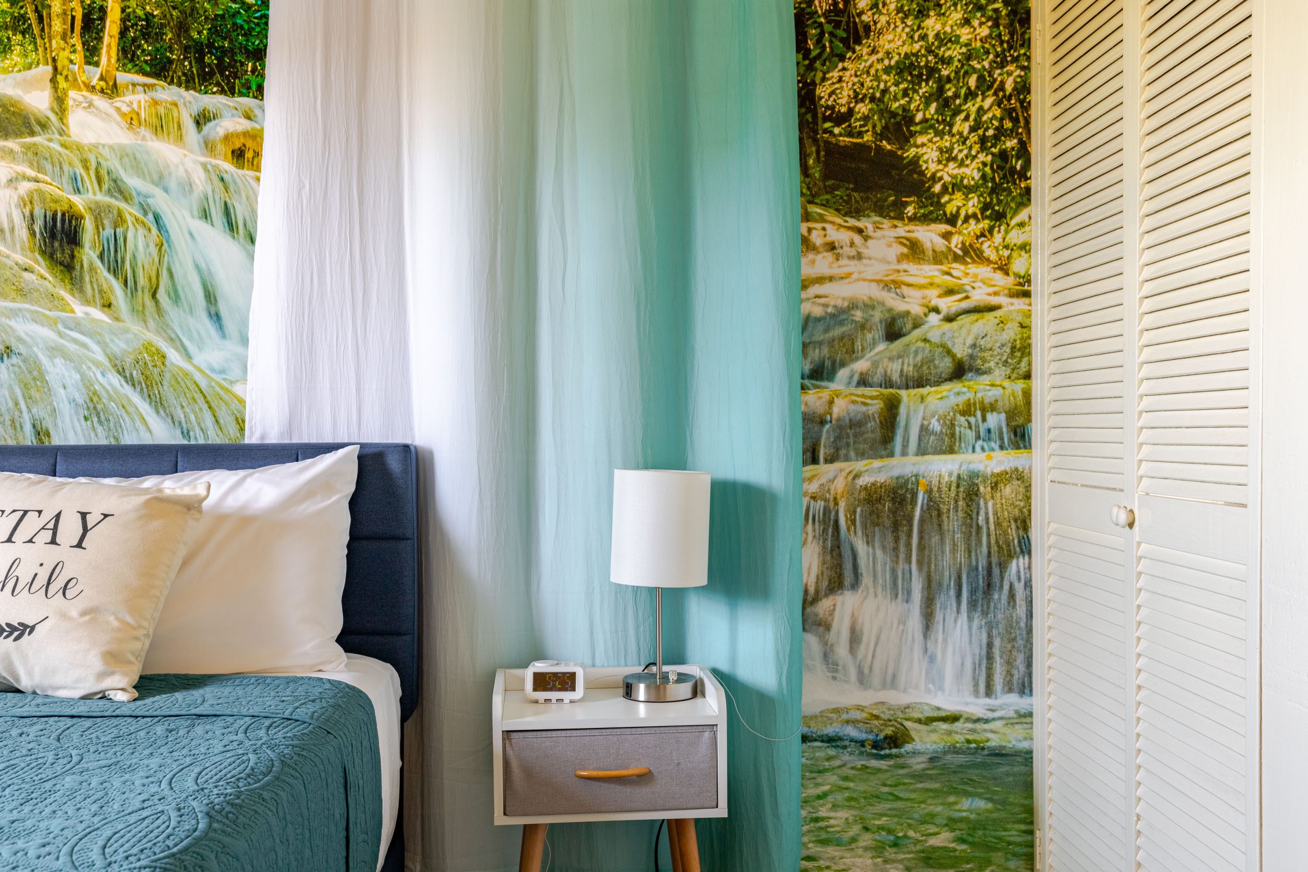 A closer look at the waterfall bedroom and its bedside details